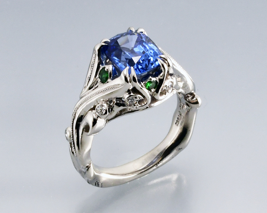 Natural blue Ceylon sapphire hand engraving with blue sapphires, emeralds, and diamonds engagement ring