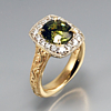 Yellow and white gold green sapphire halo setting with white diamonds intricate hand engraving engagement ring