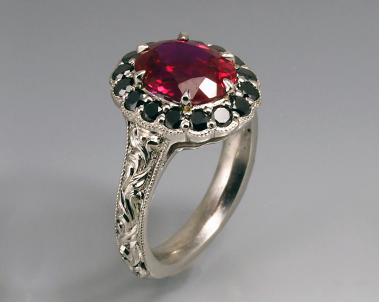 Two tone 14K gold lab-grown ruby halo setting with intricate hand engraving engagement ring