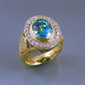 december birthstone sapphire and diamond ring in white and yellow gold