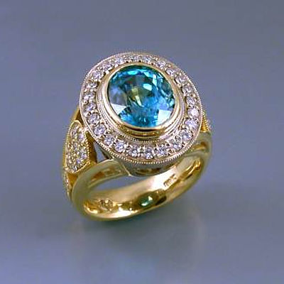 december birthstone sapphire and diamond ring in white and yellow gold