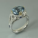 march birthstome aquamarine and diamond ring in white and yellow gold