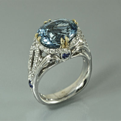 march birthstome aquamarine and diamond ring in white and yellow gold