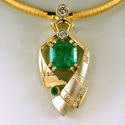 may birthstone emerald and diamond pendant in platinum and yellow gold